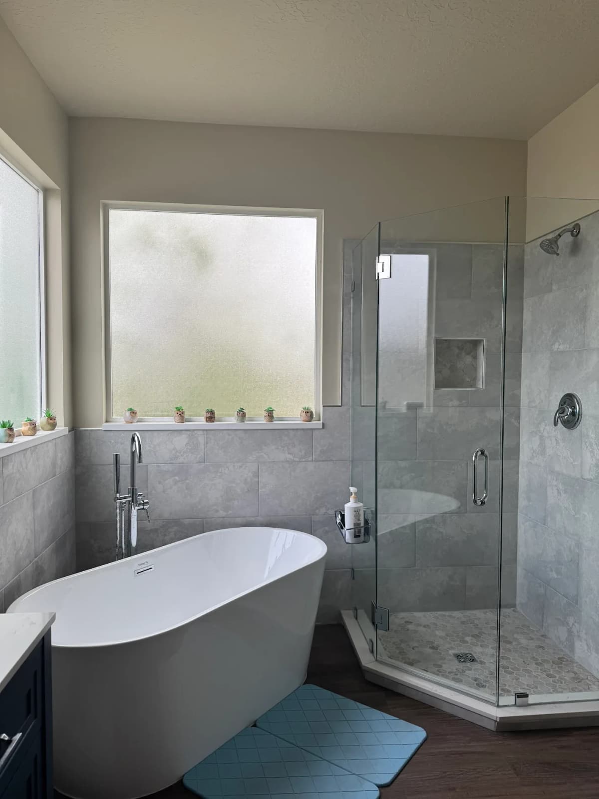 Bathroom after remodeling — freestanding tub and custom shower by Fixer Handyman LLC